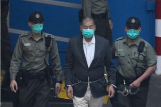 Alleged Hong Kong Crypto Swindler Tied to Singapore Money Laundering Syndicate