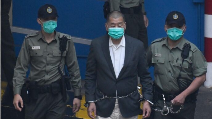 Alleged Hong Kong Crypto Swindler Tied to Singapore Money Laundering Syndicate