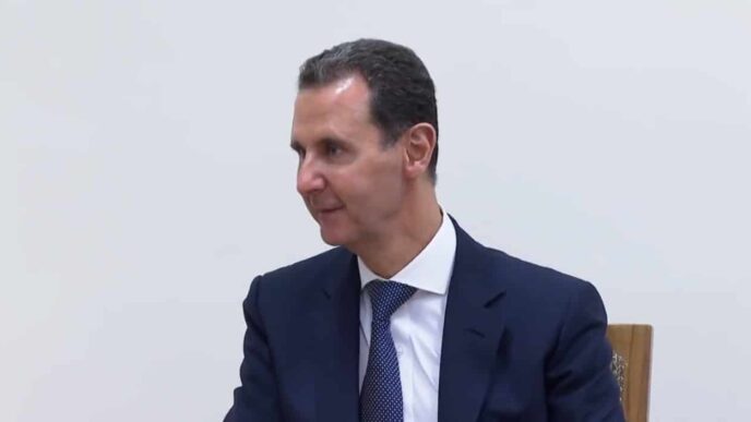Syria rebel leader says goal is to overthrow Assad