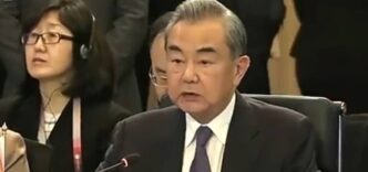 China FM calls on UK, EU to help defend global trade