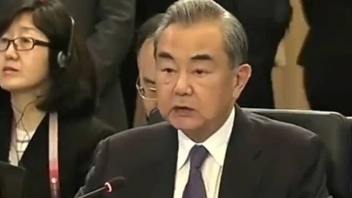China FM calls on UK, EU to help defend global trade